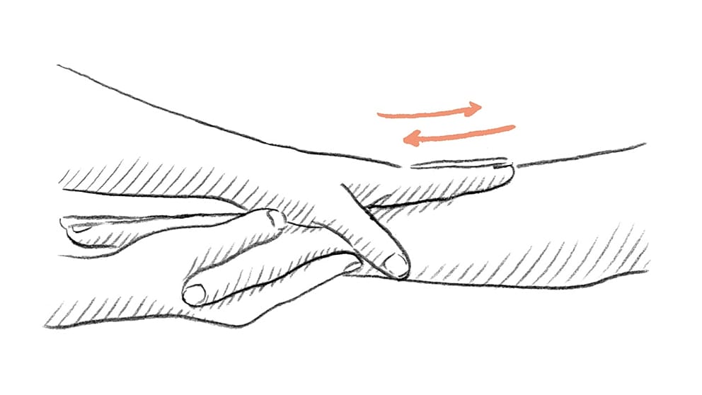 Step 1: Gently stroke the hand Hold the hand to be massaged with your supporting hand